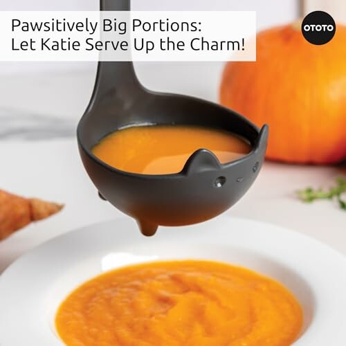 Cat-shaped ladle pouring orange soup into a bowl.