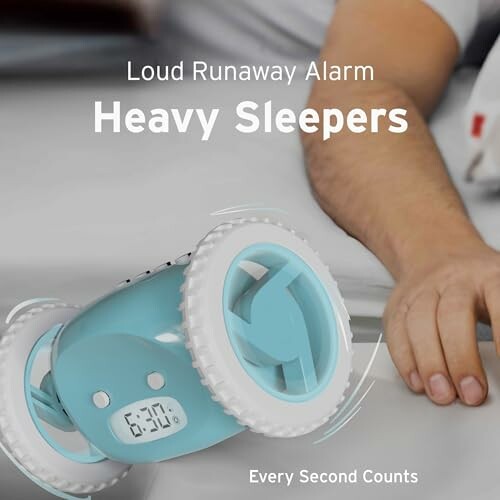 Loud runaway alarm clock for heavy sleepers on a table.