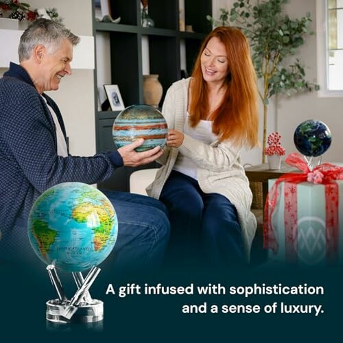 Couple exchanging decorative globes as gifts.