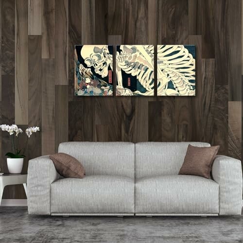 Living room with a gray sofa, wooden wall paneling, and a triptych artwork featuring a skeleton.