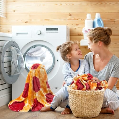 Mother and daughter doing laundry together in a cozy room.